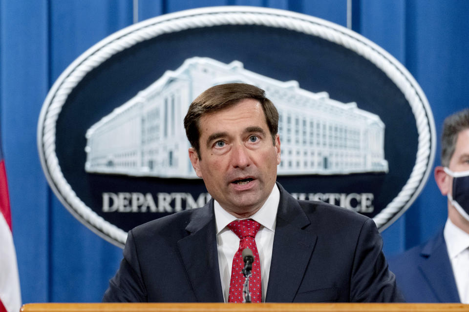 Assistant Attorney General for the National Security Division John Demers speaks at a news conference at the Department of Justice, Monday, Oct. 19, 2020, in Washington. (AP Photo/Andrew Harnik, pool)