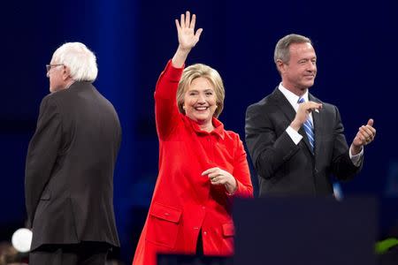 Democratic presidential candidates Bernie Sanders, Hillary Clinton and Martin O'Malley arrive at the 2015 Jefferson-Jackson Dinner in Des Moines, Iowa, October 24, 2015. REUTERS/Scott Morgan