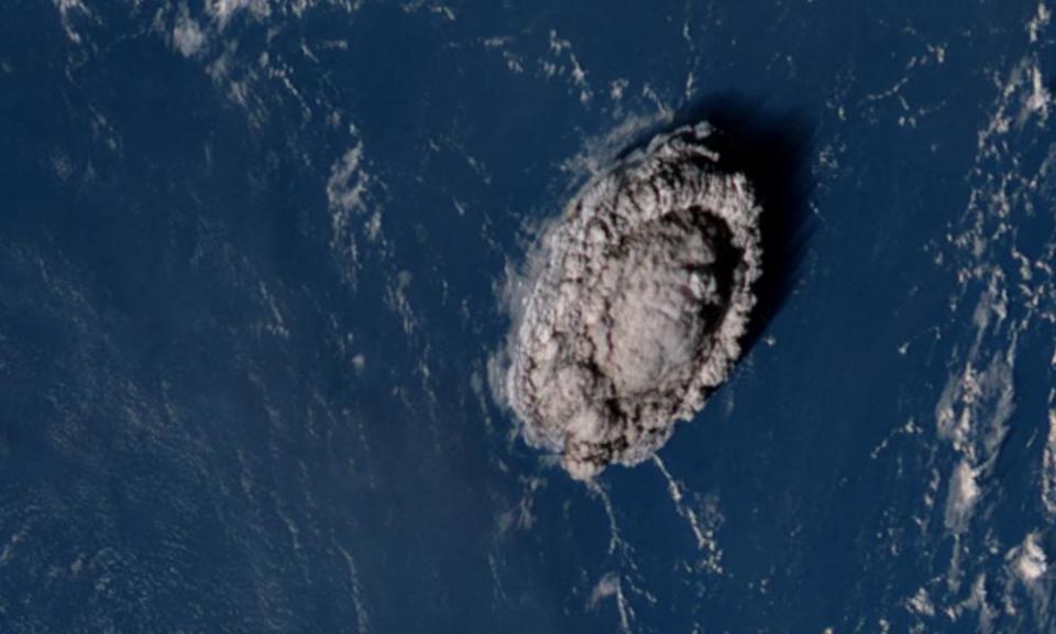 A plume rises over Tonga when the underwater volcano Hunga Tonga-Hunga Ha’apai erupted in this satellite image taken by a Japanese weather satellite on 15 January.