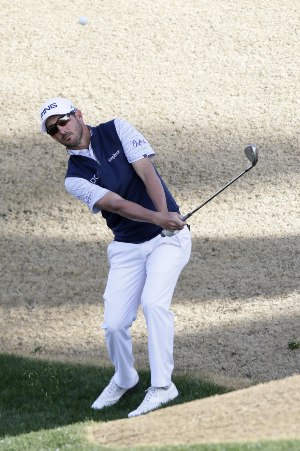 Andrew Landry hits to the seventh green during the third round of The American Express golf tournament on the Nicklaus Tournament Course at PGA West in La Quinta, Calif., Saturday, Jan. 18, 2020. (AP Photo/Alex Gallardo)