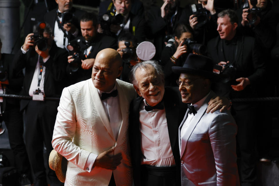 Laurence Fishburne, from left, director Francis Ford Coppola, and Giancarlo Esposito pose for photographers upon departure at the premiere of the film 'Megalopolis' at the 77th international film festival, Cannes, southern France, Thursday, May 16, 2024. (Photo by Millie Turner/Invision/AP)