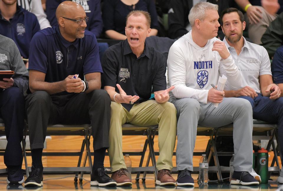 North Florida Ospreys head coach Matthew Driscoll on the bench during Friday night's game at Jacksonville University. Jacksonville University Dolphins hosted the University of North Florida Ospreys in Men's basketball in the historic Swisher Gym Friday night, February 23, 2024. The Ospreys led 25 to 23 at the half. [Bob Self/Florida Times-Union]