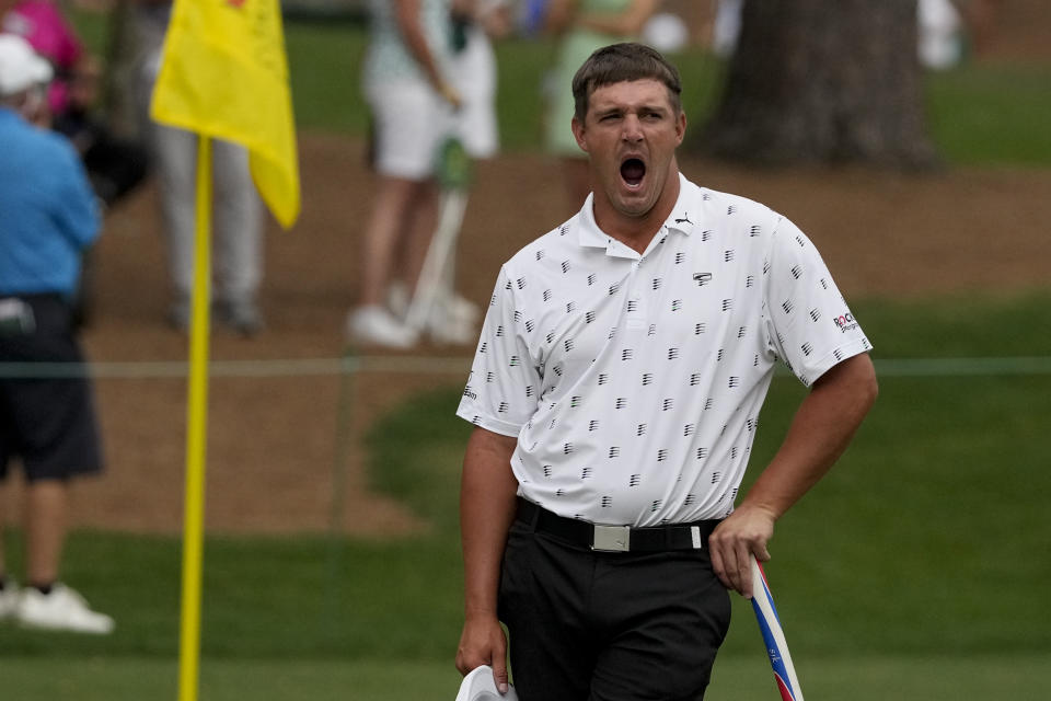 Bryson DeChambeau yawns as he waits to putt on the 16th hole during the first round of the Masters golf tournament on Thursday, April 8, 2021, in Augusta, Ga. (AP Photo/Charlie Riedel)