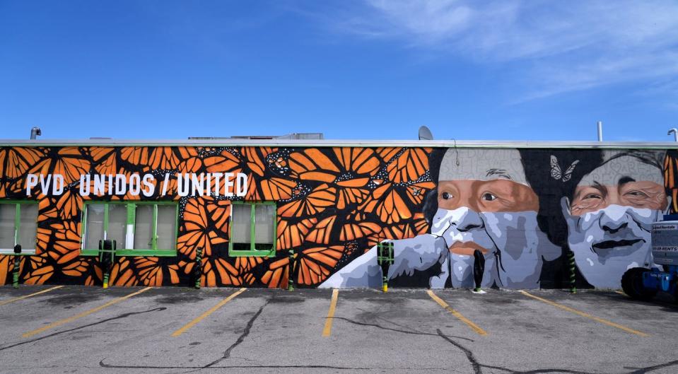 Mural artist Angela "AGONZA" Gonzalez on May 18, 2022 at the site of her new mural on at the Lilian Feinstein Senior Center on Academy Ave in Providence. 