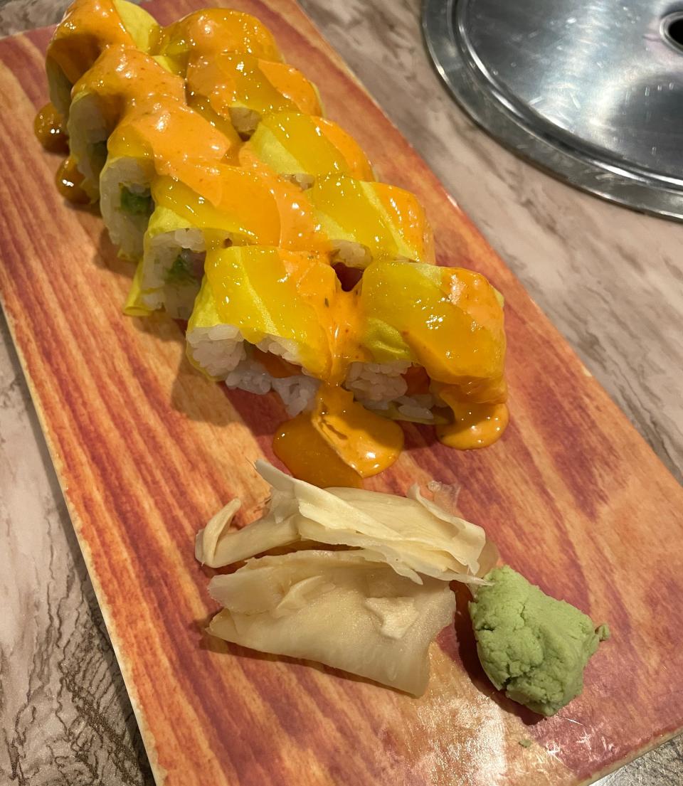 The Audi roll at Kintaro features yellowtail, salmon, tuna, avocado and soy paper with mango sauce and spicy mayo.