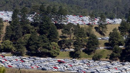 New cars are parked at a stock area of the Volkswagen German automaker plant in Sao Bernardo do Campo August 20, 2014. REUTERS/Paulo Whitaker