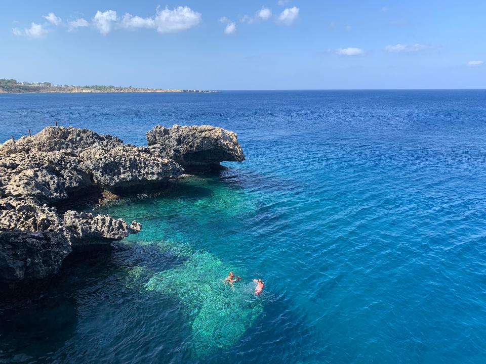 people swimming of the coast of cyprus