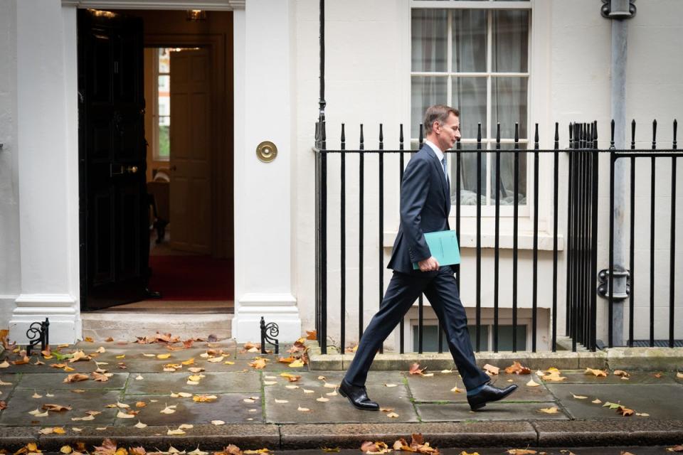 Chancellor of the Exchequer Jeremy Hunt leaves 11 Downing Street (PA Wire)
