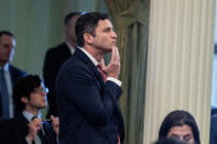 Assemblyman Jesse Gabriel, chair of the Assembly Budget committee, D-Encino, watches as the votes are posted on measure to reduce the state budget deficit at the Capitol in Sacramento, Calif., Thursday, April 11, 2024. Both houses approved the bill that takes a number of steps to reduce the state budget deficit by about $17 billion. Gov. Gavin Newsom has said the deficit is about $38 billion. (AP Photo/Rich Pedroncelli)