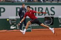 Tennis - French Open - Roland Garros - Novak Djokovic of Serbia vs Yen-Hsun Lu of Taiwan - Paris, France - 24/05/16. Novak Djokovic in action. REUTERS/Benoit Tessier