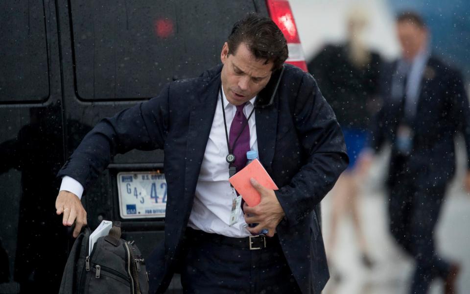 White House communications director Anthony Scaramucci arrives at Andrews Air Force Base, Md., Friday, July 28, 2017, to board Air Force One to travel with President Donald Trump to Brentwood, N.Y. close to where the ultra-violent street gang MS-13 has committed a string of gruesome murders - Credit: AP