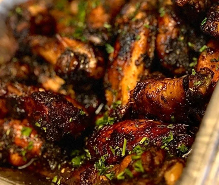 The island jerk wings at Marie's are marinated and grilled to deliver spicy flavor and the right amount of heat.