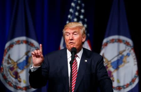 Republican U.S. Presidential nominee Donald Trump attends a campaign event at Briar Woods High School in Ashburn, Virginia, U.S., August 2, 2016. REUTERS/Eric Thayer