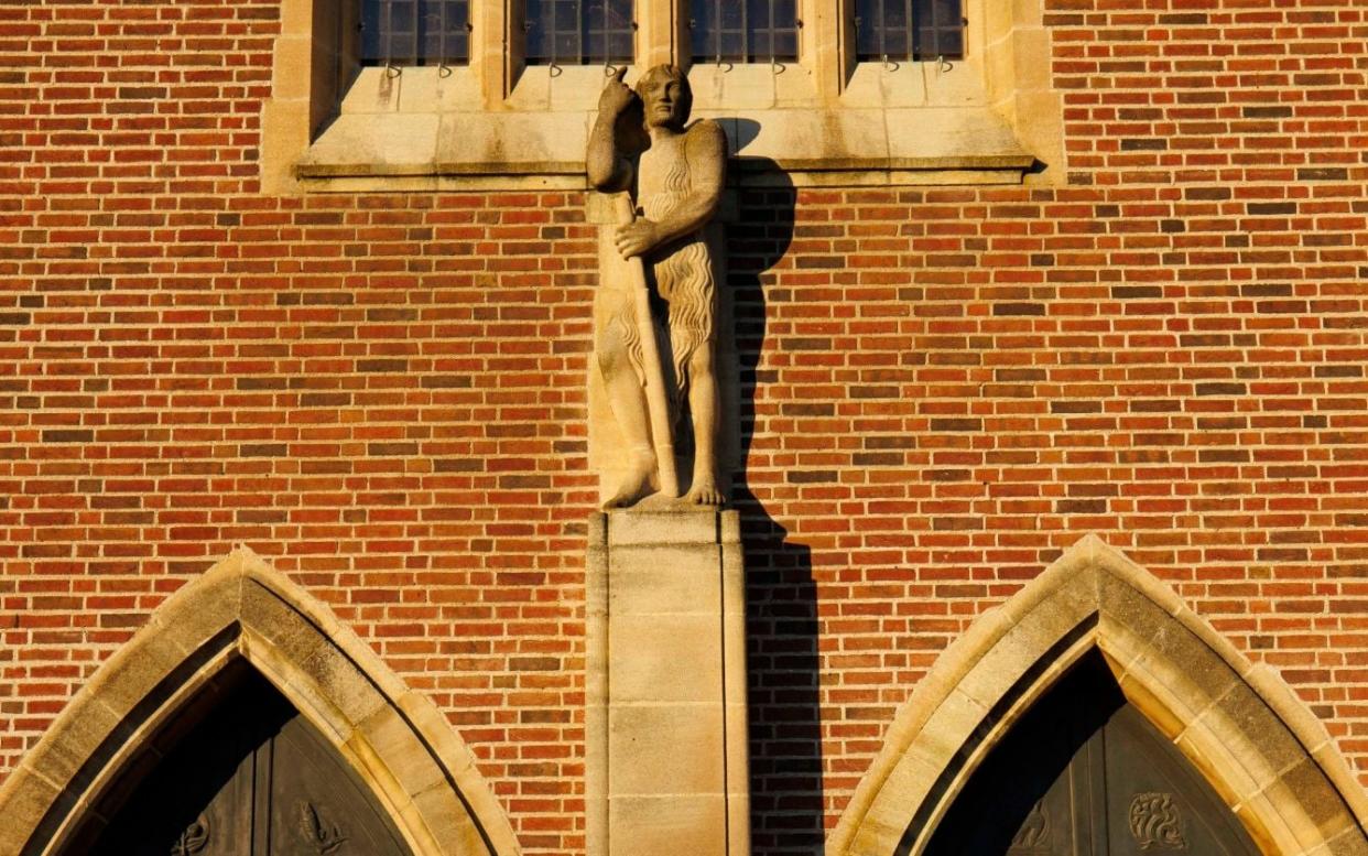 Eric Gill's sculpture of St John the Baptist is positioned above the doors of Guildford Cathedral - Jamie Lorriman