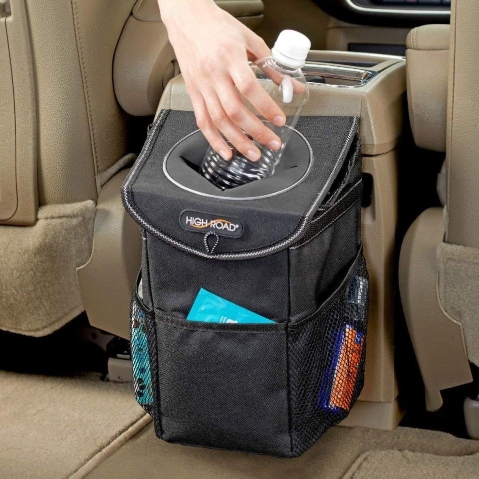 <p>If you don't have this <span>High Road StashAway Car Trash Can</span> ($16, originally $30), you're missing out. It's a mini trash can that's perfect for stashing junk, wrappers, empty water bottles, and more. It also has three side pockets for extra storage. It can hang on the back of the seat or behind the center console of your car. </p>