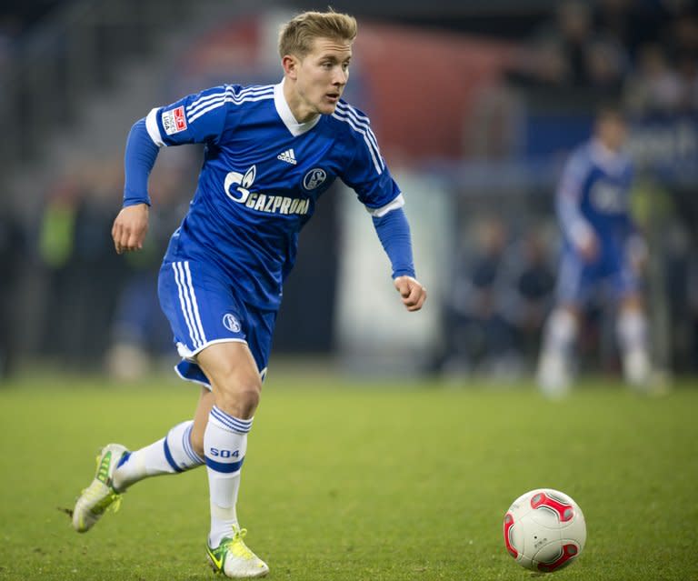 This picture taken on November 27, 2012 shows Schalke's Lewis Holtby in action against Hamburg. Tottenham Hotspur-bound Holtby will quit the Bundesliga to fulfil his dream of playing in England, but the midfielder insists the move will not harm his Germany prospects