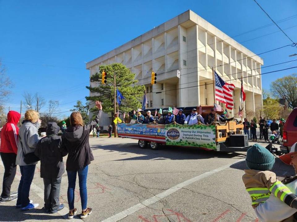 The Bath Building, pictured during the March 2023 Raleigh St. Patrick’s Day Parade. A North Carolina state government building that had Department of Health and Human Services office space, will be demolished in 2023. The land will be turned into green space.