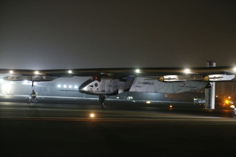 Solar Impulse 2 arrives at Al Batin Airport in Abu Dabi, completing its world tour on July 26, 2016 in the United Arab Emirates