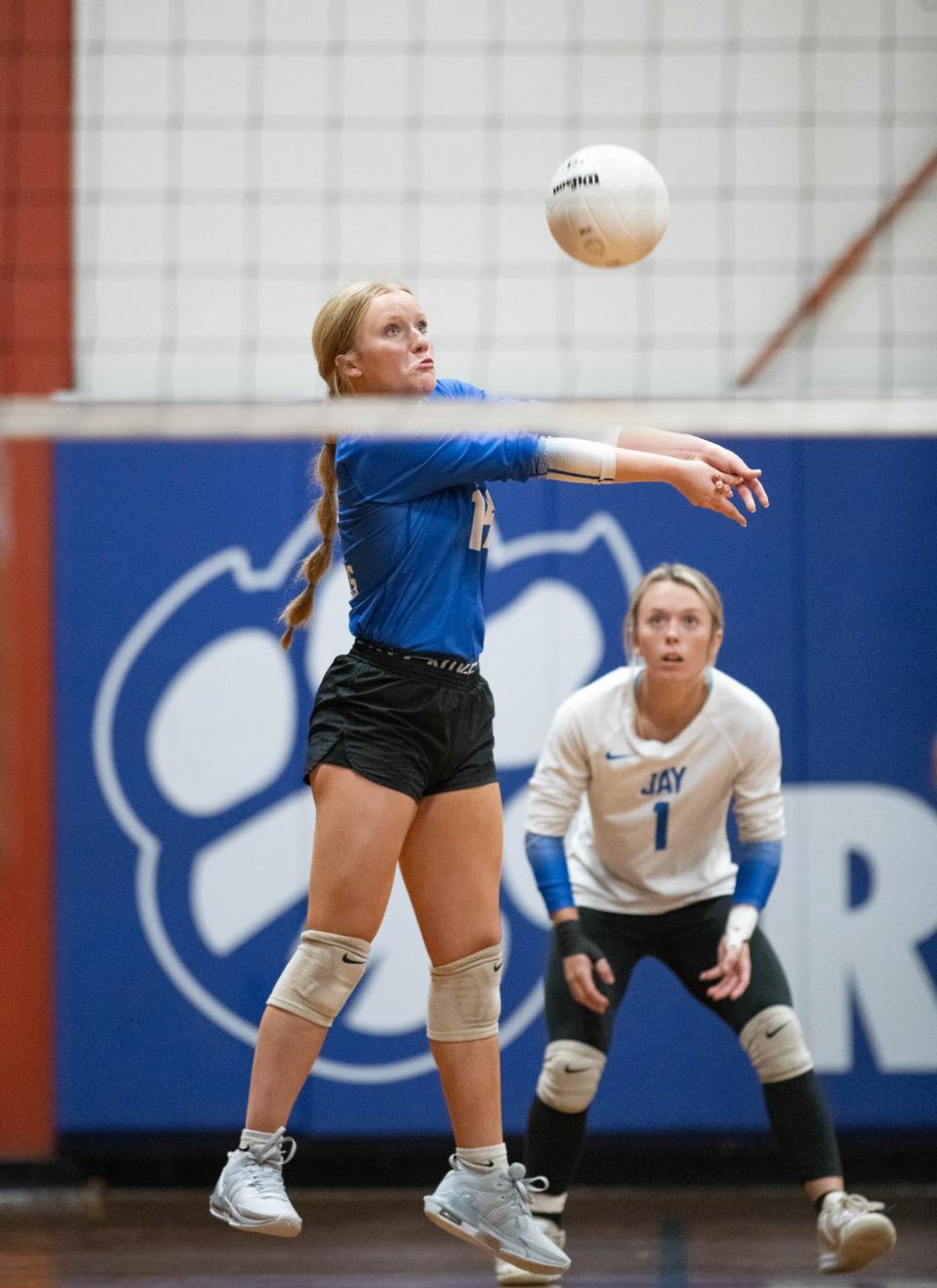 Kaylee Gilbreath (14) plays the ball during the Baker vs Jay 1-1A District Tournament championship volleyball match at Jay High School on Thursday, Oct. 19, 2023.