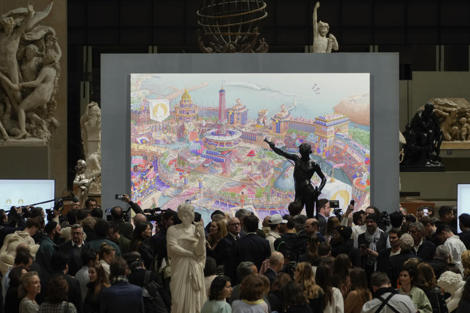 The Paris 2024 Olympic and Paralympic posters are unveiled at the Musee d'Orsay, in Paris, Monday, March 4, 2024. Vibrant colors and striking landmarks illuminate posters for the Paris Olympic Games in an Art Deco style inspired by the city's flamboyant past. (AP Photo/Thibault Camus)