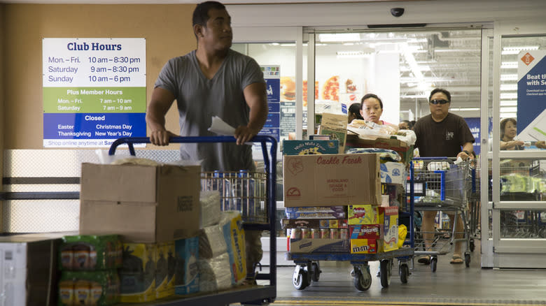 shoppers exiting Sam's Club