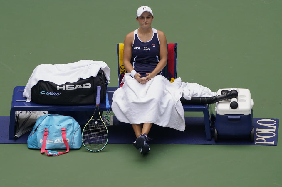 Ashleigh Barty, of Australia, waits during a break in play against Vera Zvonareva, of Russia, during the first round of the US Open tennis championships, Tuesday, Aug. 31, 2021, in New York. (AP Photo/John Minchillo)