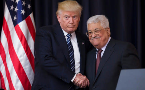 Mr Trump called Mahmoud Abbas, the Palestinian president, to tell him he plans to move ahead with moving the embassy - Credit: EPA/ATEF SAFADI