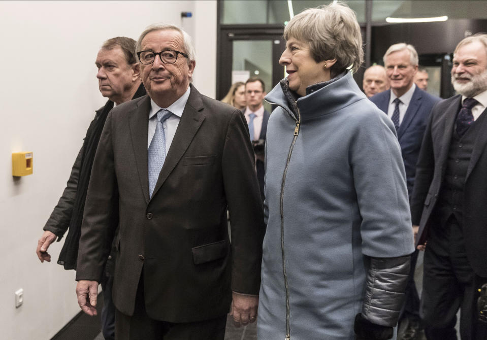 European Commission President Jean-Claude Juncker, left, welcomes Britain's Prime Minister Theresa May at the European Parliament in Strasbourg, eastern France, Monday, March 11, 2019. Prime Minister Theresa May is making a last-ditch attempt to get concessions from EU counterparts on elements of the agreement they all reached late last year. (AP Photo/Jean-Francois Badias, Pool)