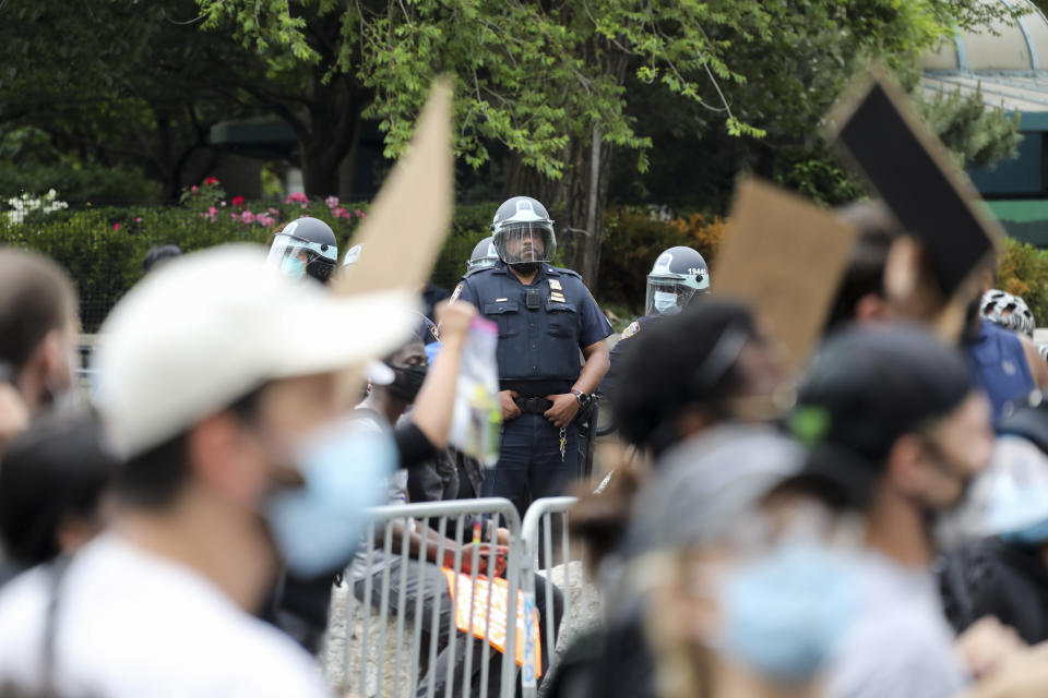 NEW YORK, June 3, 2020 -- Police officers monitor a protest over the death of George Floyd in New York, the United States, June 2, 2020. New York City will be under a curfew from 8 p.m. to 5 a.m. the next morning till Sunday to curb criminal acts emerging from protests over the death of black man George Floyd, Mayor Bill de Blasio said on Tuesday. (Photo by Wang Ying/Xinhua via Getty) (Xinhua/Wang Ying via Getty Images)