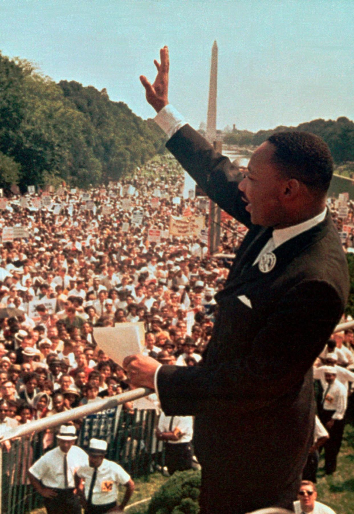 The Rev. Dr. Martin Luther King Jr. acknowledges the crowd at the Lincoln Memorial for his "I Have a Dream" speech during the March on Washington, D.C. on Aug. 28, 1963.