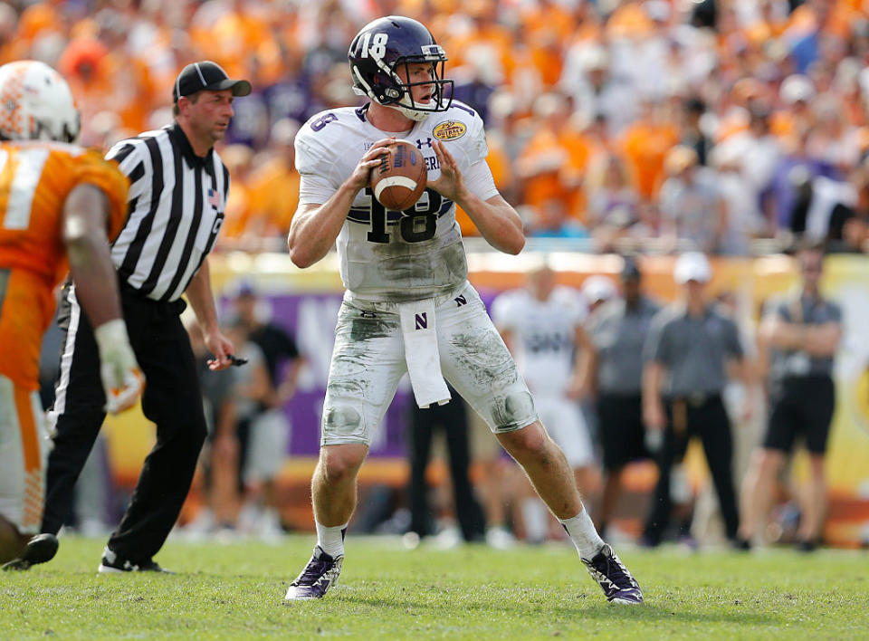 TAMPA, FL - JANUARY 1: Clayton Thorson #18 of the Northwestern Wildcats against the Tennessee Volunteers during the Outback Bowl at Raymond James Stadium on January 1, 2016 in Tampa, Florida. (Photo by Mike Carlson/Getty Images)