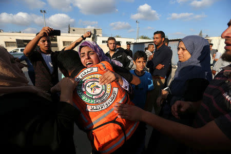 A relative of a Palestinian who was killed by Israeli troops east of Khan Younis, reacts in the central Gaza Strip July 20, 2018. REUTERS/Ibraheem Abu Mustafa