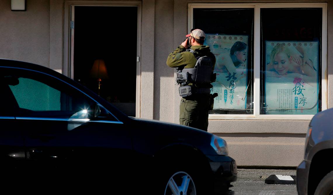 Kennewick police help federal agents search a massage business in Kennewick.