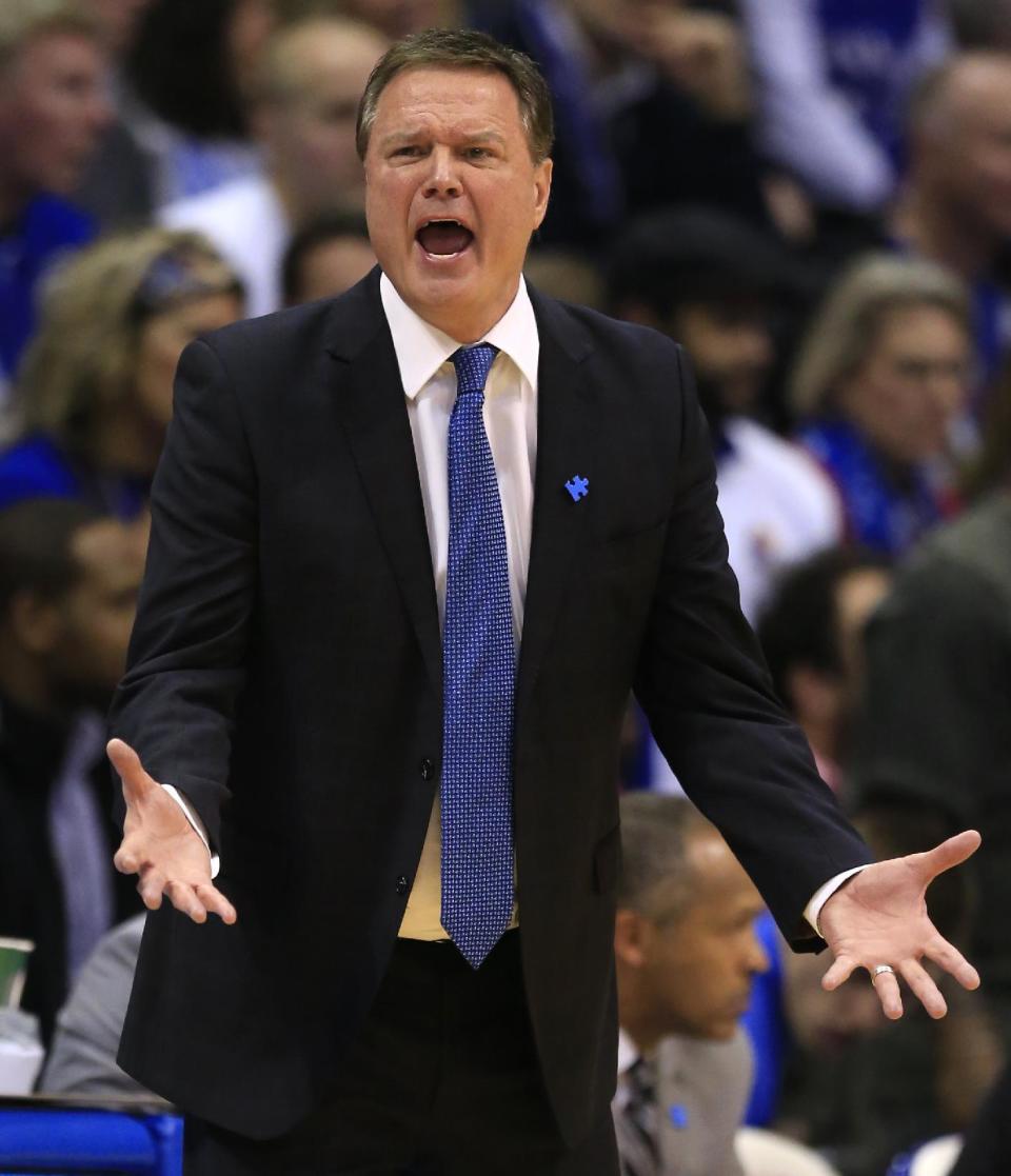 Kansas head coach Bill Self pleads with his team during the second half of an NCAA college basketball game against Iowa State in Lawrence, Kan., Saturday, Feb. 4, 2017. (AP Photo/Orlin Wagner)