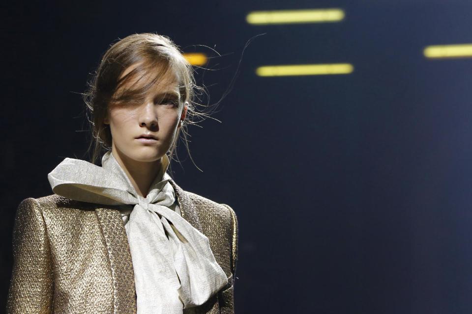 A model presents a creation as part of Lanvin's ready-to-wear Spring/Summer 2014 fashion collection, presented Thursday, Sept. 26, 2013 in Paris. (AP Photo/Jacques Brinon)