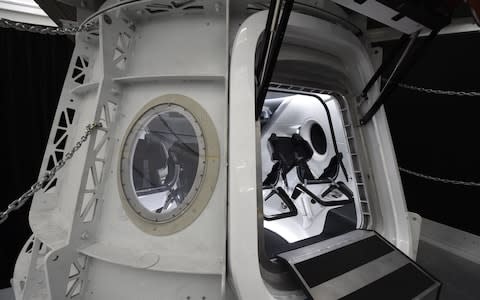 SpaceX Crew Dragon simulator used to train NASA astronauts who will travel to the International Space Station aboard Crew Dragon - Credit:  ROBYN BECK/AFP