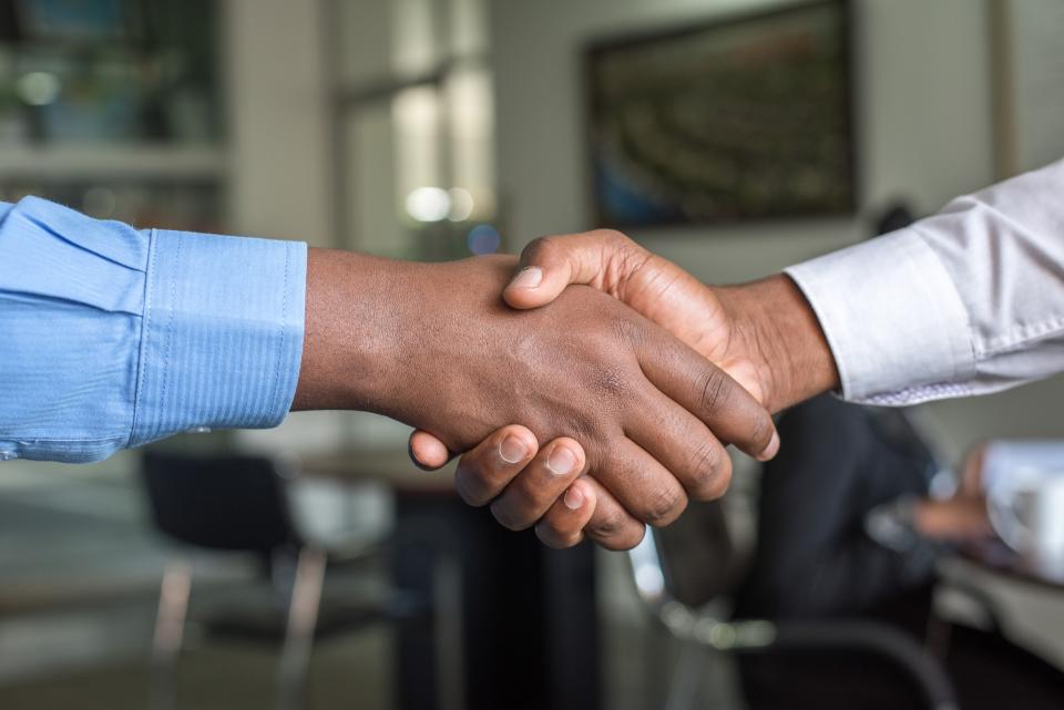 A handshake is the UK’s preferred workplace greeting. Photo: Cytonn Photography/Unsplash