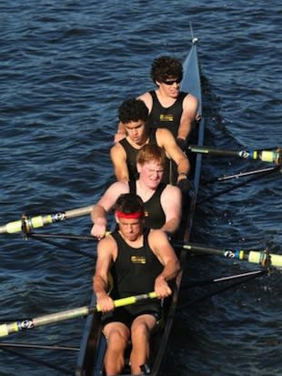 Blake Haxton (front) leads the Upper Arlington crew before his amputations — CaringBridge.org