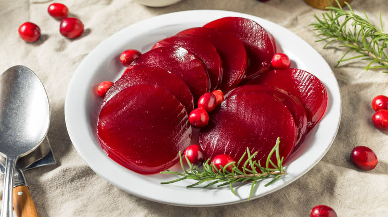 sliced canned cranberry sauce on plate