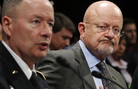 General Keith Alexander (L), director of the National Security Agency (NSA) testifies at a House Intelligence Committee hearing on Capitol Hill in Washington October 29, 2013. REUTERS/Jason Reed