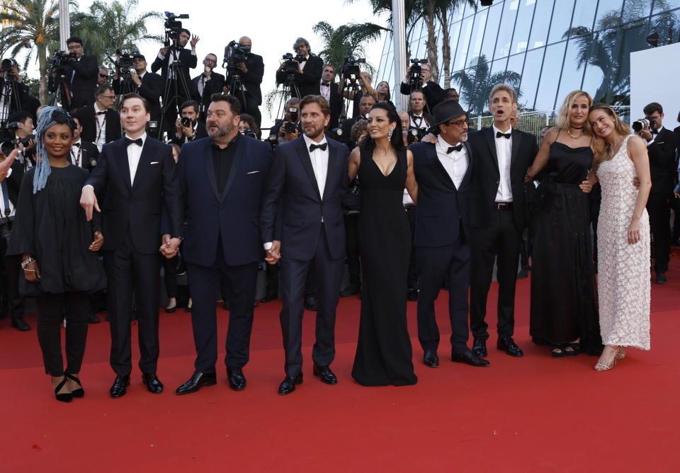 Jury members Rungano Nyoni, from left, Paul Dano, Denis Menochet, Ruben Ostlund, Maryam Touzani, Atiq Rahim, Damian Szifron, Julia Ducournau, and Brie Larson pose for photographers upon arrival at the awards ceremony during the 76th international film festival, Cannes, southern France, Saturday, May 27, 2023. (Photo by Joel C Ryan/Invision/AP)