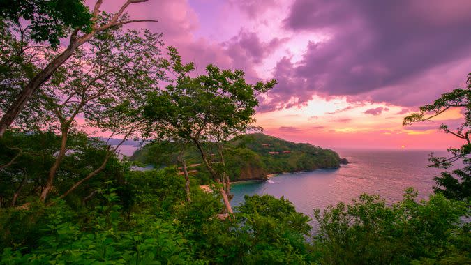 A shot of beautiful sunset over Coast Rica coastline.