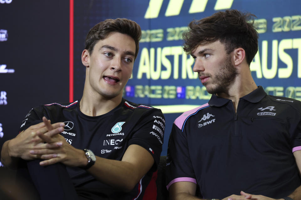 Mercedes driver George Russell of Britain, left, and Alpine driver Pierre Gasly of France chat during a press conference ahead of the Australian Formula One Grand Prix at Albert Park in Melbourne, Thursday, March 30, 2023. (AP Photo/Asanka Brendon Ratnayake)