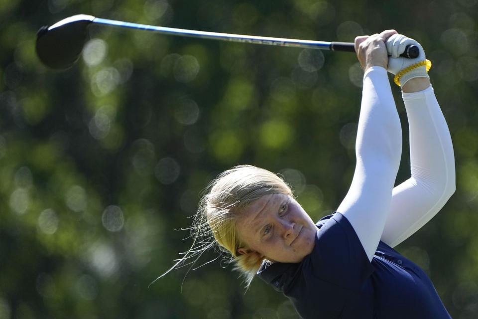 Ingrid Lindblad, of Sweden, takes a shot on the 12th tee during the first round of the U.S. Women's Open golf tournament at the Pine Needles Lodge & Golf Club in Southern Pines, N.C. on Thursday, June 2, 2022. (AP Photo/Chris Carlson)