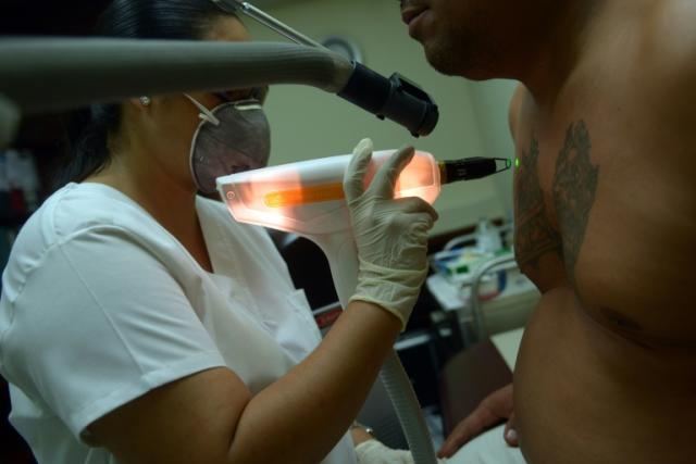 Former gang members in an El Salvadorian prison cross through their  distinctive tattoos | Daily Mail Online