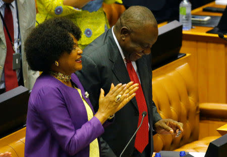 Cyril Ramaphosa is applauded by Parliament Speaker Baleka Mbete after being elected President of South Africa in Parliament in Cape Town, South Africa, February 15, 2018. REUTERS/Mike Hutchings