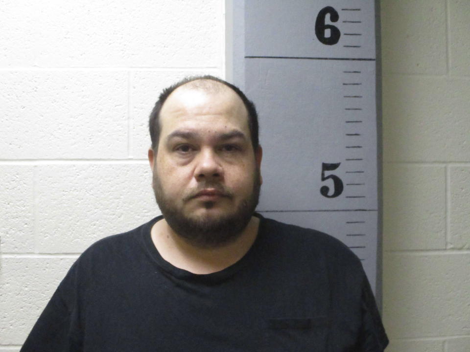 This booking photo provided by the Hill County Sheriff's Office in Havre, Mont., shows Edmund Davis on Monday, Oct. 23, 2023. Davis, who was arrested Monday, is charged with two counts of sexual abuse of children for images of child sexual abuse discovered on a cellphone. Davis had been living in Havre with Alicia Navarro, a teenager who disappeared from Arizona four years ago and who reappeared in 2022 asking for her name to be taken off the missing person's list. (Hill County Sheriff's Office via AP)