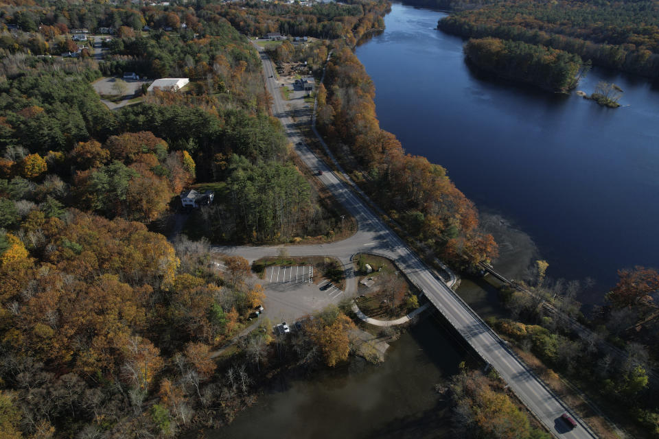 The Miller Park Boat Launch on the Androscoggin River is shown on Tuesday, Oct. 31, 2023, in Lisbon, Maine. This is where authorities found the Army reservist, Robert Card's, vehicle after he shot and killed 18 people at a bowling alley and then a bar and grille in Lewiston. His body was found at the Maine Recycling Corporation, about 8 miles southeast of where the second shooting occurred on Wednesday, Oct. 25. (AP Photo/Jessie Wardarski)