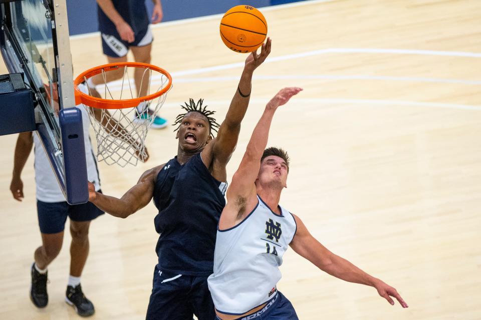 Notre Dame's Ven-Allen Lubin fights for a rebound with Nate Laszewski during practice Tuesday, July 19, 2022 at the Rolfs Athletics Hall in South Bend. 