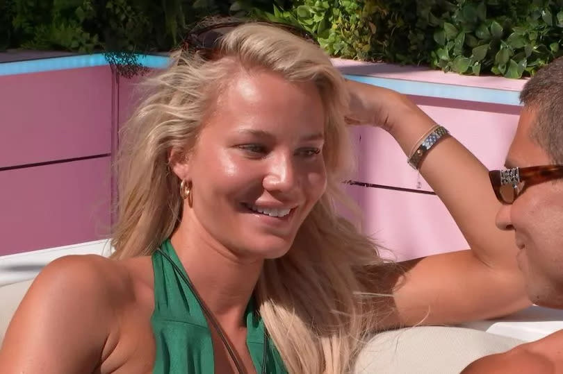 Grace from Love Island in a green bikini